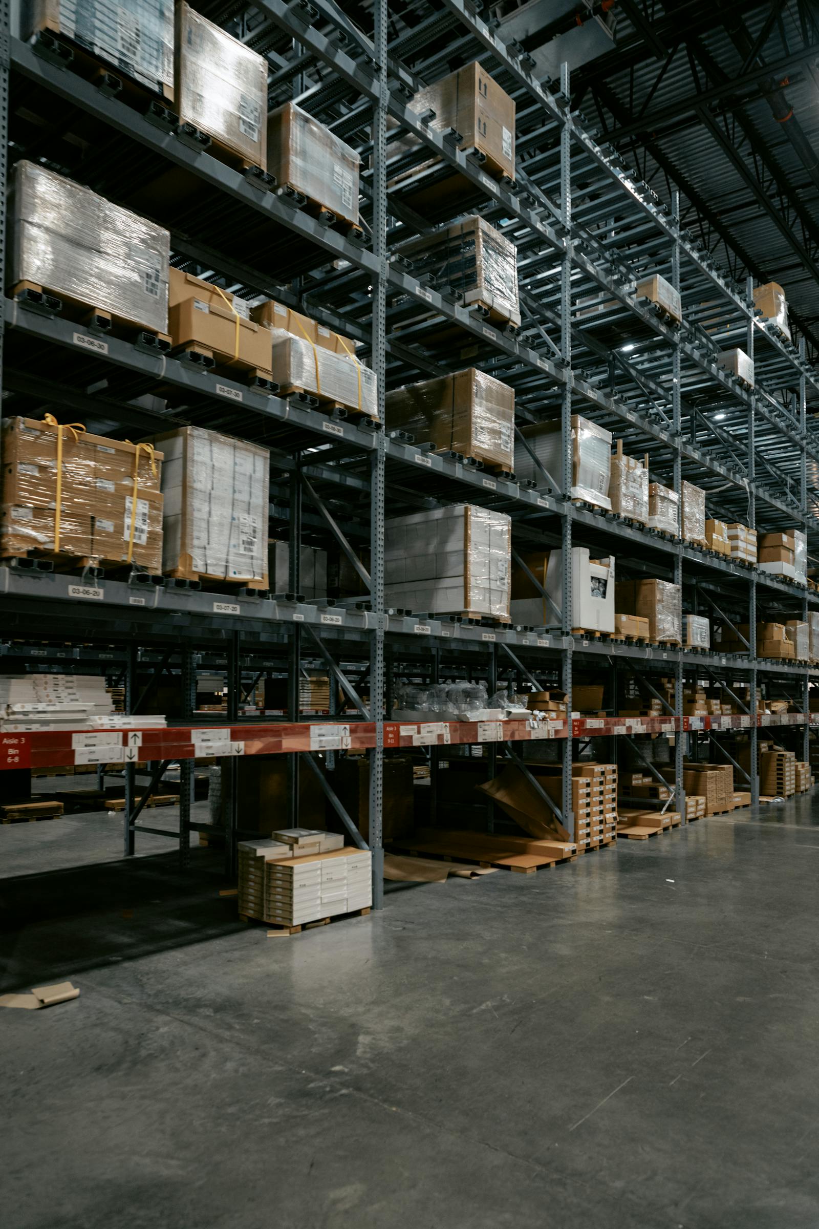 Multiple shipments staged and organized by project in warehouse